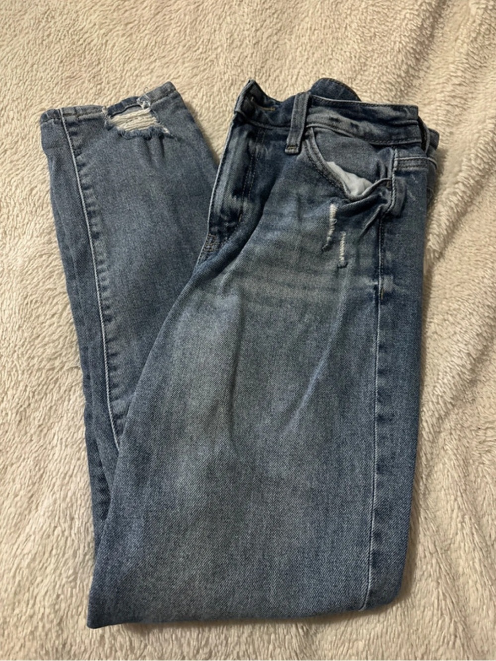 SO Women’s Skinny Jeans in Washed Blue with Distressed Detail
